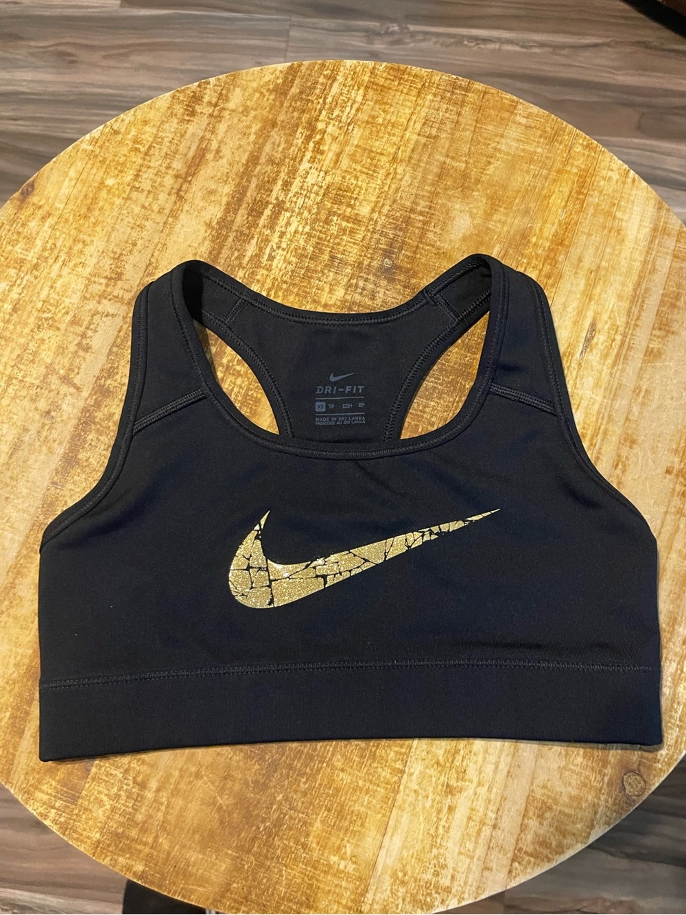 Nike  women Black Sports Bra with Metallic Gold Swoosh size xs